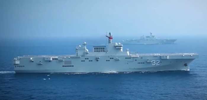 Screenshot from video of CNS Guangxi (LHD-32) and CNS Hainan (LHD-31) sailing in formation