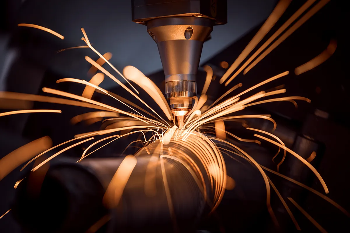 sparks flying from metal cutting machine